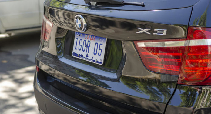 Nikolaev, Ukraine - August 26, 2020: Rear of BMW X3 car in the parking lot.